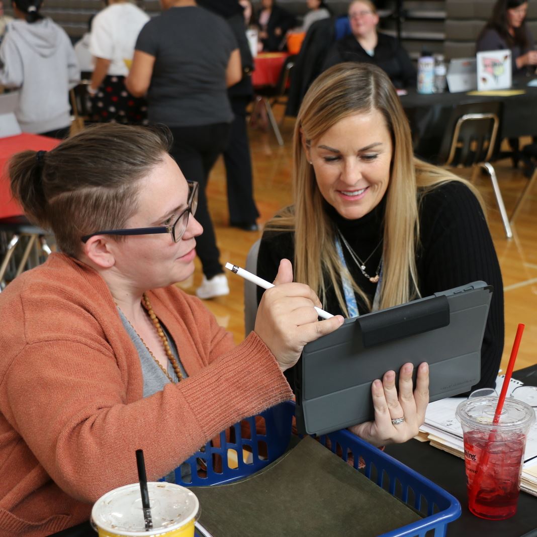  Familes and staff work together at conferences